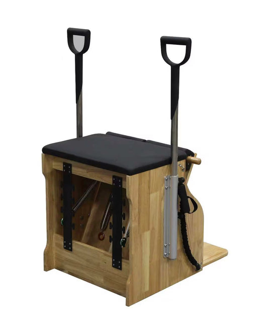 Wooden pilates chair with black seat and handles on a white background